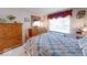 Comfortable bedroom featuring neutral carpet, and traditional furniture including a matching dresser set at 6146 Franklin Villas Way, Indianapolis, IN 46237