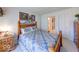Charming bedroom with carpeted floor, traditional furnishings, and access to an en-suite bathroom at 6146 Franklin Villas Way, Indianapolis, IN 46237