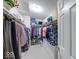 Walk-in closet with clothing racks and shelves offering optimal storage and organization space at 6146 Franklin Villas Way, Indianapolis, IN 46237
