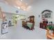 Bright dining area features vaulted ceilings and opens to an adjacent kitchen for seamless entertaining at 6146 Franklin Villas Way, Indianapolis, IN 46237
