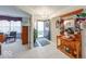 Welcoming foyer features an decorated front door and a wooden hall tree with decorative mirror at 6146 Franklin Villas Way, Indianapolis, IN 46237