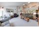 Spacious living area with skylights, vaulted ceiling, and an open layout at 6146 Franklin Villas Way, Indianapolis, IN 46237