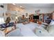 Open living area with vaulted ceilings, comfortable seating, and lots of natural light at 6146 Franklin Villas Way, Indianapolis, IN 46237