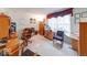 Comfortable home office featuring ample natural light, neutral carpet, and traditional wooden furniture at 6146 Franklin Villas Way, Indianapolis, IN 46237
