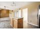 Well-designed kitchen with a center island, view into the living room, and ample cabinet space at 6472 Creekshore Ln, Indianapolis, IN 46268