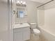 Clean bathroom featuring a tub-shower combination, a vanity sink and a toilet for essential functionality at 6628 Dunsdin Dr, Plainfield, IN 46168