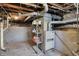 Unfinished basement with exposed pipes and mechanicals at 704 Baronne St, Lebanon, IN 46052