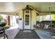Charming front porch featuring swing, door decor, and stylish accents at 704 Baronne St, Lebanon, IN 46052