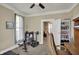 Bright room featuring exercise equipment, a desk, and a cozy atmosphere, perfect for a home office at 704 Baronne St, Lebanon, IN 46052