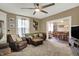 Spacious living room with plush furniture and open access to the dining area at 704 Baronne St, Lebanon, IN 46052