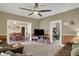 Open-concept living room with a large TV and comfortable seating at 704 Baronne St, Lebanon, IN 46052