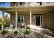 Inviting covered front porch with rocking chairs and charming decor at 7926 White Pine Dr, Avon, IN 46123
