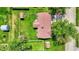 Aerial view of a home featuring a well-manicured lawn, a shed, and a covered patio area at 8141 Rob Ln, Indianapolis, IN 46237