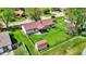 Aerial view of a home with a large, green lawn, a shed, and a covered patio area at 8141 Rob Ln, Indianapolis, IN 46237