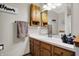 Bathroom with a wide vanity, ample storage, and decorative accents at 8141 Rob Ln, Indianapolis, IN 46237