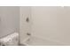 Bathroom featuring a white shower and bathtub at 8145 Railroad Rd, Indianapolis, IN 46217