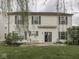 Backyard showcasing the patio, well maintained lawn, and vinyl siding of the home at 820 Scotch Pine Dr, Greenwood, IN 46143