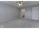 Clean bedroom with neutral carpet and view of the bathroom and closet space at 820 Scotch Pine Dr, Greenwood, IN 46143