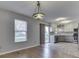 Dining area next to the kitchen features hardwood floors, a window and a sliding door at 820 Scotch Pine Dr, Greenwood, IN 46143