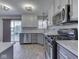 Open kitchen features updated appliances, ample counter space, and natural light at 820 Scotch Pine Dr, Greenwood, IN 46143