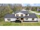 Aerial view of a home showcasing its lawn, well-kept landscaping, siding, roof, and neighborhood at 8315 N Payne Rd, Indianapolis, IN 46268