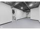 Bright basement featuring access to the stairs and mechanical equipment at 8315 N Payne Rd, Indianapolis, IN 46268