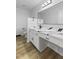 Bathroom featuring an elegant vanity with modern sink fixtures and tile flooring at 8315 N Payne Rd, Indianapolis, IN 46268