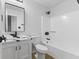 Well-lit bathroom featuring white fixtures and black hardware, creating a modern aesthetic at 8315 N Payne Rd, Indianapolis, IN 46268