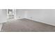 Neutral bedroom featuring new carpet, fresh paint, and a doorway to a dressing area at 8315 N Payne Rd, Indianapolis, IN 46268