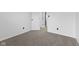 Neutral bedroom featuring new carpet, fresh paint, and modern interior doors at 8315 N Payne Rd, Indianapolis, IN 46268