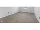 Neutral bedroom featuring new carpet, fresh paint, and a window for natural light at 8315 N Payne Rd, Indianapolis, IN 46268