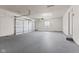 Spacious two-car garage with a sealed floor, offering ample parking and storage at 8315 N Payne Rd, Indianapolis, IN 46268