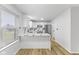 Modern kitchen featuring white cabinets, marble countertops, and stainless steel appliances at 8315 N Payne Rd, Indianapolis, IN 46268
