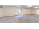 Spacious finished basement featuring neutral carpet, a window, and open floor plan for versatile use at 8727 Redditch Dr, Avon, IN 46123