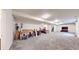 Spacious finished basement featuring neutral carpet and an open floor plan for versatile use at 8727 Redditch Dr, Avon, IN 46123