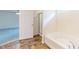 Bathroom featuring a linoleum floors, a soaking tub, and a shower at 8727 Redditch Dr, Avon, IN 46123