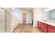 Bathroom featuring a double vanity, linoleum floors, shower, and a soaking tub at 8727 Redditch Dr, Avon, IN 46123