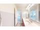 Bathroom boasts a double sink with a marble countertop and an open door to the hallway at 8727 Redditch Dr, Avon, IN 46123