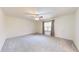 Bedroom with neutral walls, gray carpet, and a ceiling fan at 8727 Redditch Dr, Avon, IN 46123