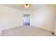 Open bedroom with neutral carpet and views into other areas of the home at 8727 Redditch Dr, Avon, IN 46123