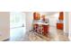 This kitchen features wood cabinets, stainless appliances and an eat-in bar at 8727 Redditch Dr, Avon, IN 46123