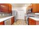 This modern kitchen features stainless appliances, mosaic backsplash and stone countertops at 8727 Redditch Dr, Avon, IN 46123
