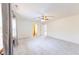 Large living room with carpet, neutral walls, and a ceiling fan at 8727 Redditch Dr, Avon, IN 46123