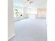 Spacious loft with light gray carpet, neutral walls, and natural light at 8727 Redditch Dr, Avon, IN 46123