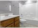 Bathroom featuring a single sink, toilet, and shower/bath combo at 9417 Glencroft Way, Indianapolis, IN 46250