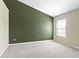 Carpeted bedroom with gray and white walls and one window at 9417 Glencroft Way, Indianapolis, IN 46250