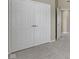 Large closet doors in carpeted bedroom with doorway to next room at 9417 Glencroft Way, Indianapolis, IN 46250