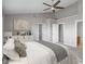 Spacious main bedroom featuring a tray ceiling and an en-suite bathroom at 9417 Glencroft Way, Indianapolis, IN 46250