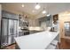 Modern kitchen with gray cabinets, quartz countertops, stainless steel appliances and hardwood floors at 949 Harrison St, Indianapolis, IN 46202