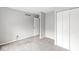 This bedroom has neutral paint and carpet with a double-door closet at 9553 Maple Way, Indianapolis, IN 46268